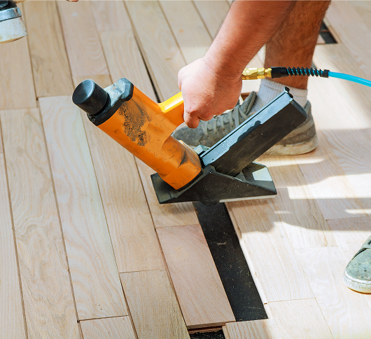 carpenter worker installing wood