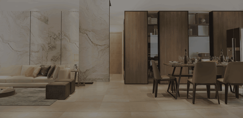 living room with a white sofa and a dining area with a wooden table and chairs