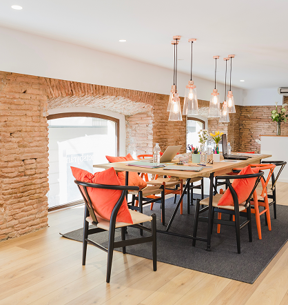 Modern kitchen dining area with stylish light wood kitchen floor covering
